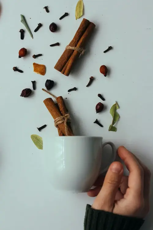 Multiple spices across the table, ready to be turned into tea